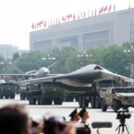 A People's Liberation Army (PLA) GJ-11 unmanned combat aerial vehicle (UCAV) is driven on a truck