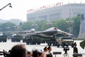 A People's Liberation Army (PLA) GJ-11 unmanned combat aerial vehicle (UCAV) is driven on a truck